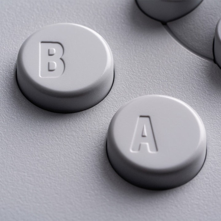 8BitDo 64 – manette Bluetooth inspirée de la N64 pour Analogue 3D, Switch et PC